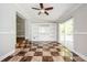 Light-filled sunroom with built-in shelving and sliding glass doors to the outdoor space at 1305 Clay Sw Rd, Mableton, GA 30126