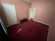 A cozy bedroom featuring a closet and a window at 2703 Hillvale Cove Dr, Lithonia, GA 30058