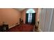 Bedroom showcasing carpet and a unique arch window at 2703 Hillvale Cove Dr, Lithonia, GA 30058
