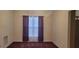 Bedroom with window and neutral walls; features space for customizations at 2703 Hillvale Cove Dr, Lithonia, GA 30058