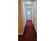 Hallway with carpet flooring and neutral walls at 2703 Hillvale Cove Dr, Lithonia, GA 30058