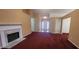 Bright living room with a marble fireplace and white trim at 2703 Hillvale Cove Dr, Lithonia, GA 30058