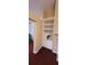 Built-in shelving and fireplace in an open living area at 2703 Hillvale Cove Dr, Lithonia, GA 30058