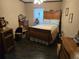 Vintage bedroom featuring a carved wooden bed frame, dresser, and soft, neutral tones at 512 S Holly Springs Rd, Woodstock, GA 30188