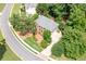 Overhead view of home showing meticulously kept lawn and landscaping at 1558 Amberwood Creek Nw Dr, Kennesaw, GA 30152