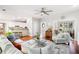 Open-concept living room with hardwood floors and easy access to the kitchen at 1558 Amberwood Creek Nw Dr, Kennesaw, GA 30152