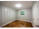 Small bedroom with hardwood floors and a window at 3042 Monterey Dr, Decatur, GA 30032