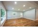 Inviting living space featuring hardwood floors, recessed lighting, and neutral color palette at 3042 Monterey Dr, Decatur, GA 30032