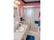 Bathroom with marble countertop and enclosed shower featuring a glass door at 3206 Pyrite Sw Cir, Atlanta, GA 30331