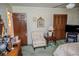 Bedroom featuring vintage wallpaper, natural lighting, and furnishings at 3206 Pyrite Sw Cir, Atlanta, GA 30331
