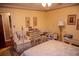 Relaxing bedroom with cozy chair, complemented by antique furniture and soft lighting at 3206 Pyrite Sw Cir, Atlanta, GA 30331