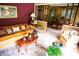 Cozy living room with comfortable seating, decorative rug, and an open view to the dining area at 3206 Pyrite Sw Cir, Atlanta, GA 30331