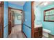 Clean bathroom featuring a vanity sink, toilet, window, and tile flooring at 35 Brookside Ct, Villa Rica, GA 30180