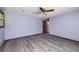 The spacious bedroom boasts modern floors, ceiling fan, and neutral paint at 35 Brookside Ct, Villa Rica, GA 30180