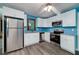 Modern kitchen featuring white cabinets and stainless steel appliances at 35 Brookside Ct, Villa Rica, GA 30180