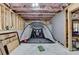 Unfinished basement area with a golf simulator setup, offering recreational possibilities at 4590 Sierra Creek Dr, Hoschton, GA 30548