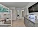 Cozy bedroom with a bunk bed, dresser, and TV providing a comfortable and inviting atmosphere at 4590 Sierra Creek Dr, Hoschton, GA 30548