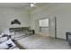 Comfortable living room with multiple sofas and view to second story at 4590 Sierra Creek Dr, Hoschton, GA 30548