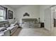 Cozy living room with comfortable sofas, large tv, and natural light at 4590 Sierra Creek Dr, Hoschton, GA 30548