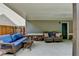 Inviting covered patio with comfortable seating, wood fence, and perfect for relaxation and outdoor living at 4590 Sierra Creek Dr, Hoschton, GA 30548