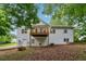 Back exterior view of home featuring a private deck and well-maintained yard at 4958 Alpine Ct, Winston, GA 30187