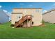 Spacious backyard with a well maintained lawn, offering plenty of space for relaxation and recreation at 506 Spring View Dr, Woodstock, GA 30188