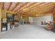 Spacious unfinished basement features open ceilings, a concrete floor, and ample room for storage at 506 Spring View Dr, Woodstock, GA 30188