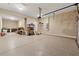 Clean garage with epoxy floor, ample lighting, and storage racks, ready for your vehicles and projects at 506 Spring View Dr, Woodstock, GA 30188