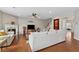Inviting living room features hardwood floors, fireplace, and neutral color palette at 506 Spring View Dr, Woodstock, GA 30188