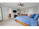 Comfortable main bedroom suite with ensuite bathroom and walk-in closet at 506 Spring View Dr, Woodstock, GA 30188