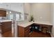 Office nook with built-in desk and storage space at 506 Spring View Dr, Woodstock, GA 30188