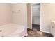 This bathroom features a tub and a closet at 11473 Summer Creek Dr, Hampton, GA 30228