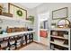 Charming craft room with custom shelving and decor at 1223 Gathering Oaks Se Ct, Mableton, GA 30126