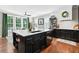 Gorgeous kitchen with granite countertops and black cabinetry at 1223 Gathering Oaks Se Ct, Mableton, GA 30126