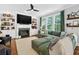 Spacious living room with fireplace and built-in shelving at 1223 Gathering Oaks Se Ct, Mableton, GA 30126