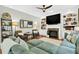 Comfortable living room with fireplace and plush seating at 1223 Gathering Oaks Se Ct, Mableton, GA 30126