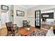 Cozy living room with stylish furnishings, decor, and seamless transition to other areas at 1223 Gathering Oaks Se Ct, Mableton, GA 30126