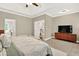 Spacious main bedroom with ensuite bathroom access and stairs access at 1223 Gathering Oaks Se Ct, Mableton, GA 30126