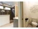 Modern bathroom featuring a walk-in shower, tile accents and contemporary fixtures at 330 Carriage Glen Ln, Woodstock, GA 30188