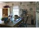 Functional home office with a spacious desk, ample storage, and natural light, ideal for productivity at 330 Carriage Glen Ln, Woodstock, GA 30188