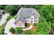 Stunning aerial view of the home, showcasing the well-manicured landscaping and spacious lot at 12130 Helleri Holw, Alpharetta, GA 30005