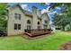 Expansive backyard with a large deck, ideal for outdoor entertaining at 12130 Helleri Holw, Alpharetta, GA 30005