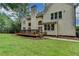 Beautiful backyard featuring a deck, perfect for enjoying outdoor living at 12130 Helleri Holw, Alpharetta, GA 30005
