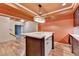 Finished basement with a bar area that has a sink, countertop, and drawer storage at 12130 Helleri Holw, Alpharetta, GA 30005