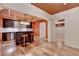 Finished basement featuring a bar area with bar stools, recessed lighting, and hardwood flooring at 12130 Helleri Holw, Alpharetta, GA 30005