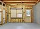 Unfinished basement with exposed wooden frames and utilities, waiting for your custom design at 12130 Helleri Holw, Alpharetta, GA 30005