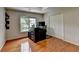 Bedroom featuring Hardwood Floors, and a Window with Natural Light at 12130 Helleri Holw, Alpharetta, GA 30005