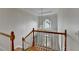 Grand foyer view from above with chandelier and staircase at 12130 Helleri Holw, Alpharetta, GA 30005