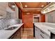 This kitchen features modern cabinetry, stainless steel appliances, and a stylish backsplash at 12130 Helleri Holw, Alpharetta, GA 30005