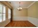 Spacious dining room features hardwood floors, crown molding, and ample natural light at 1668 Sabastian Ne Pt, Atlanta, GA 30329
